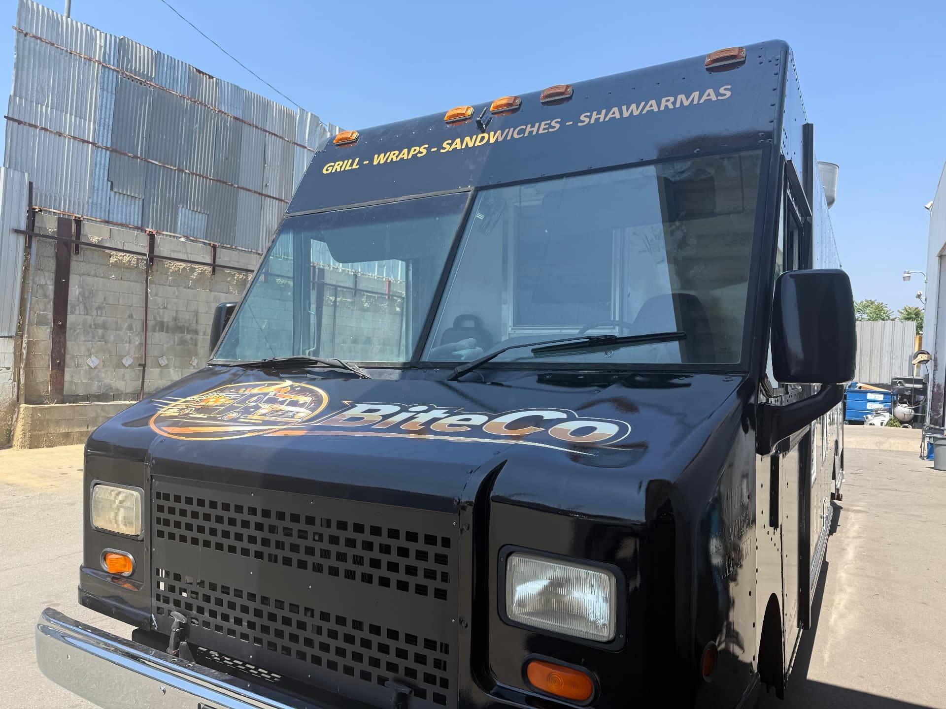 BiteCo Food truck hood with logo and menu lettering, installed by Flex Auto Care Studio