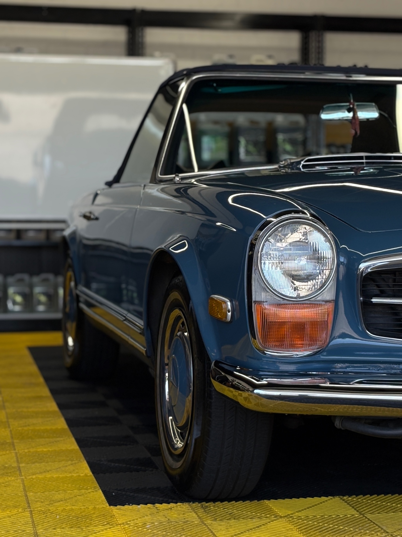 Classic blue Mercedes-Benz 280SL front three-quarter after concours detailing at Flex Auto Care Studio Pasadena