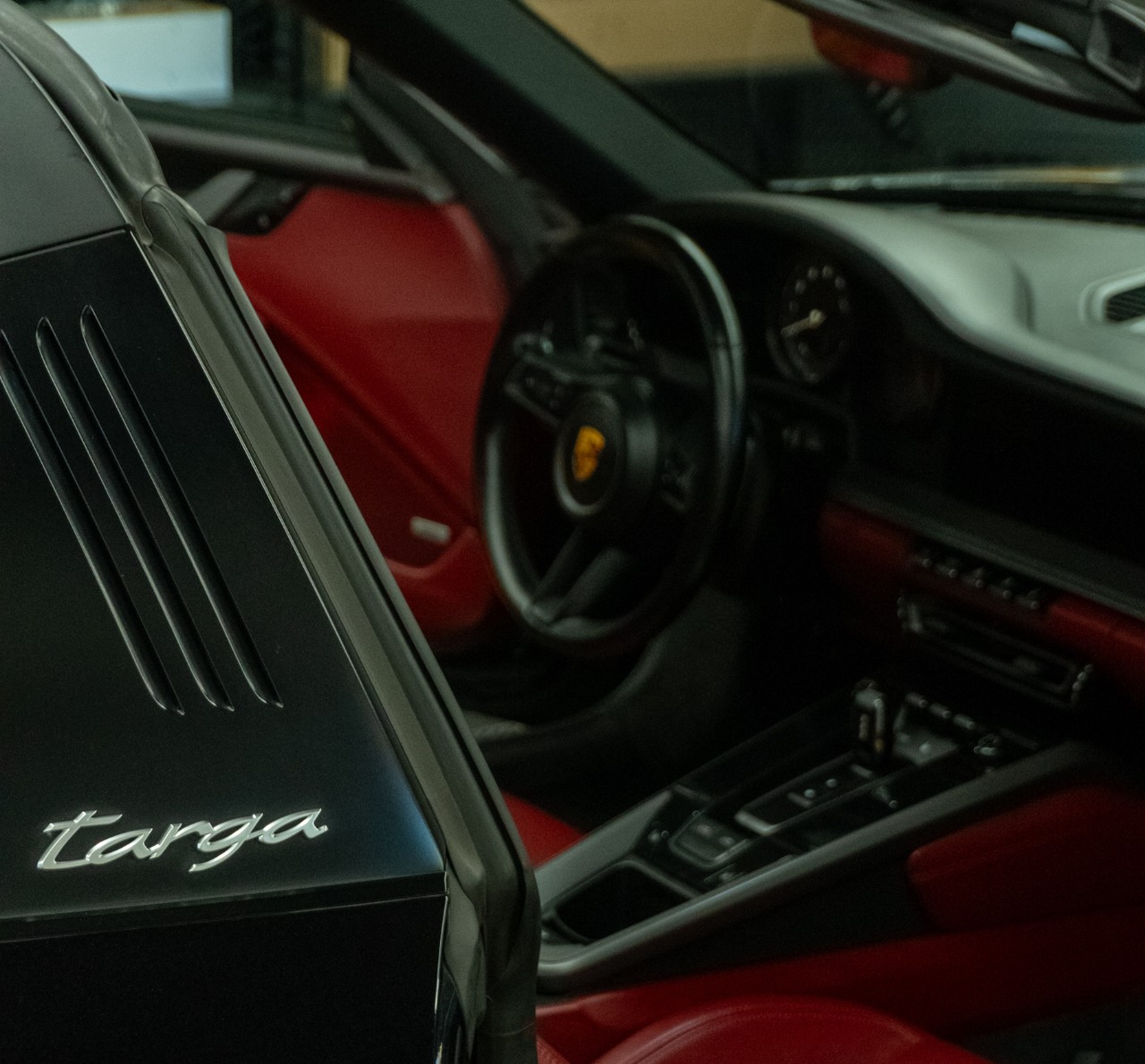 Porsche 911 Targa — detailed at Flex Auto Care Studio, Pasadena Porsche 911 Targa cockpit — targa roll bar and Bordeaux red leather interior, hand-detailed and ceramic-coated at Flex Auto Care Studio in Pasadena, California
