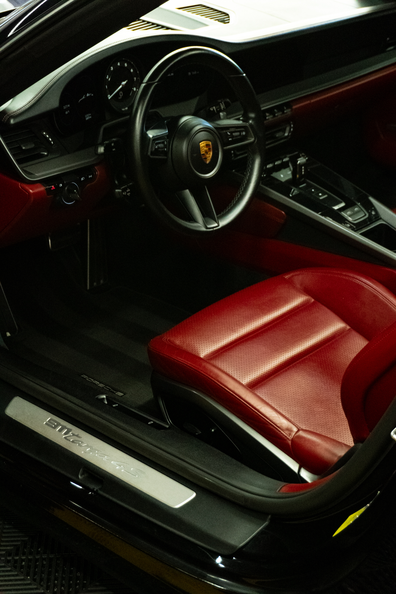 Porsche 911 Carrera 4S red leather interior detail