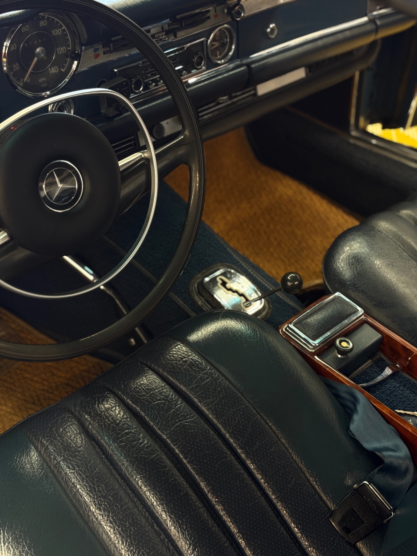 Mercedes-Benz 280SL cockpit, steering wheel and console after full interior detail